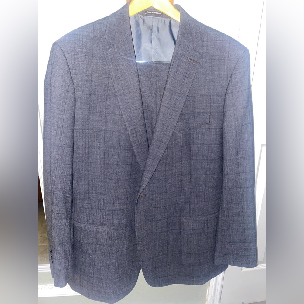 Men’s Liz Claiborne suit. Jacket is size 48R and pants are 36 waist x 32 long.